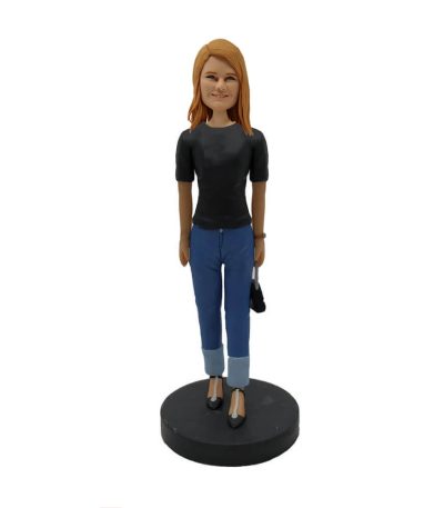 Lady Carrying a Bag Bobblehead