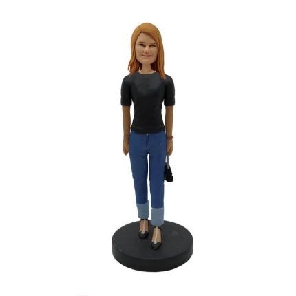 Lady Carrying a Bag Bobblehead