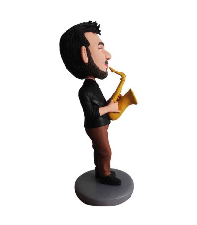White Man Blowing a Trumpet Bobblehead