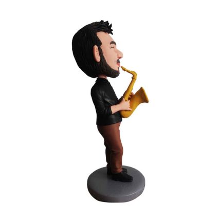 White Man Blowing a Trumpet Bobblehead