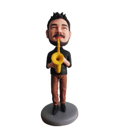 White Man Blowing a Trumpet Bobblehead