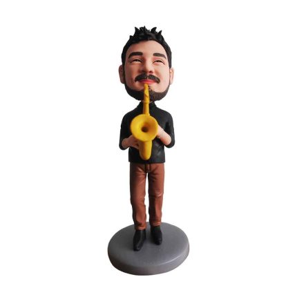 White Man Blowing a Trumpet Bobblehead